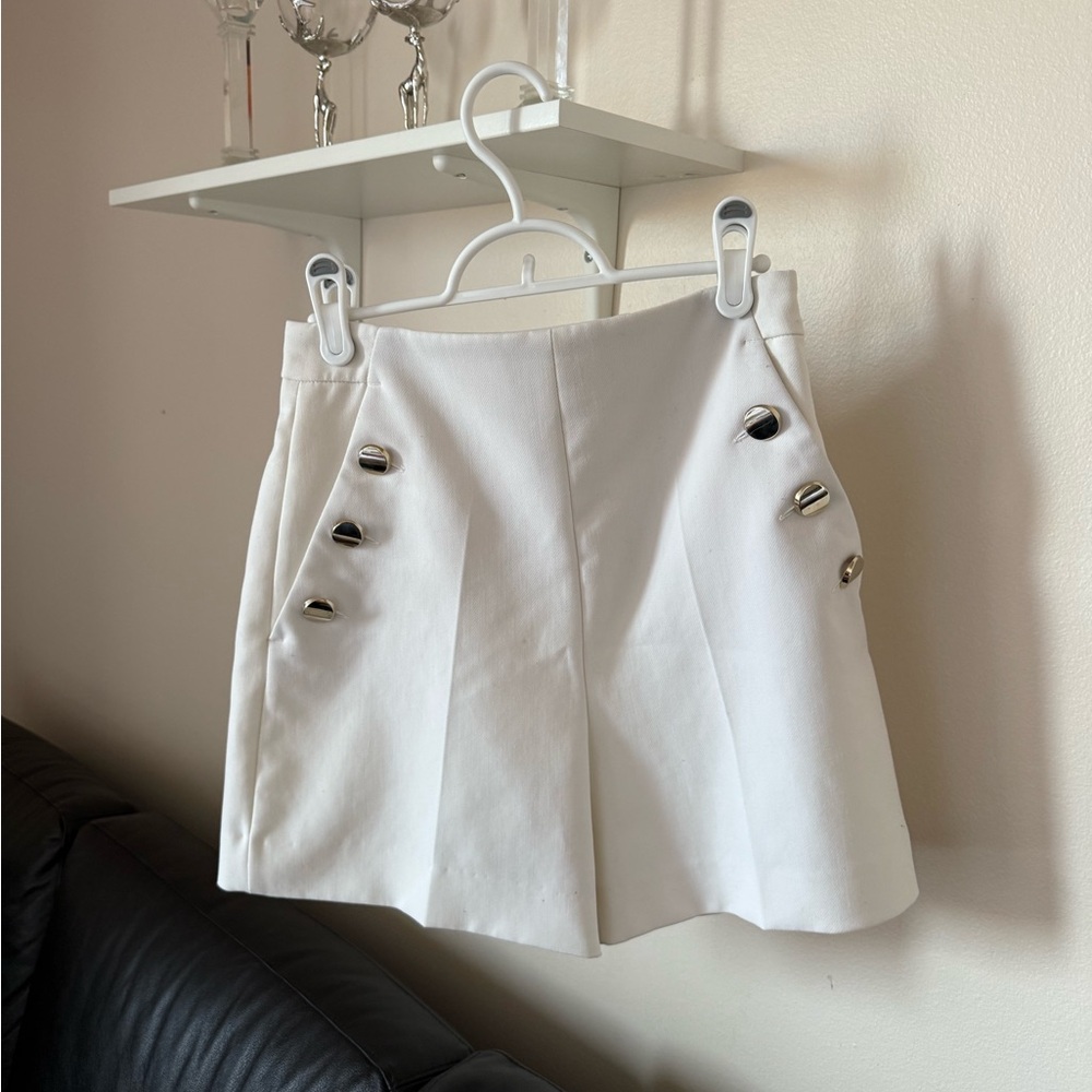 White Shorts with gold Accents